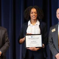 Dr. Robert Smart, Vice Provost of Research Administration and Scholarship (left), Jayla Wesley (middle), and Dr. Jeffrey Potteiger, Associate Vice-Provost of The Graduate School (right).